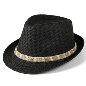 Detailed view of black woven straw fedora hat featuring a white contrast stitched band