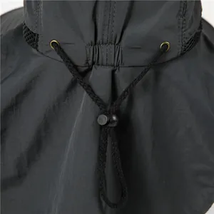 Detail of adjustable drawstring buckle and breathable mesh on dark grey outdoor sun hat