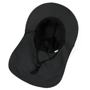 Detail of breathable mesh lining and adjustable chin strap on black sun protection hat