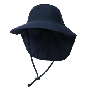 Detail of dark blue sun hat with wide brim, neck flap and breathable mesh side panels