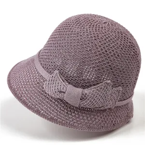 Chapeau de Soleil Femme Respirant Coton et Lin Chapeau Cloche Avec Nœud Tissage Ajouré Chapeau Pêcheur Pour Été Plage Voyage