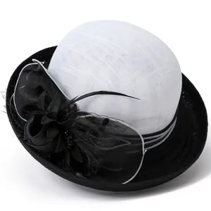 Elegant vintage French linen sun hat with black contrast brim and feather floral decor