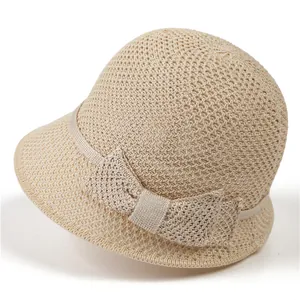 Chapeau de soleil beige clair pour femme avec texture tissée et ruban nœud élégant
