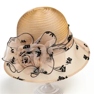 Elegant organza sun hat for women with large lace flower and black floral embroidery details