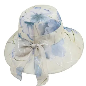 Women's wide brim sun hat with light blue floral pattern and elegant bow decoration