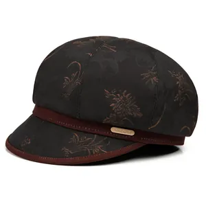 Eleganter Jacquard-Schirmmütze für ältere Damen in Schwarz und Braun mit Metall-Logo