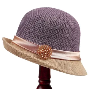 Elegant purple and beige woven cloche hat for women with satin ribbon and crystal ornament