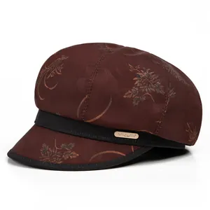Eleganter brauner Schirmmütze für Damen mit Blumenmuster und schwarzem Zierband