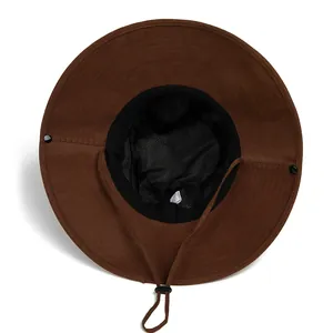Detail of dark brown sun hat with breathable black mesh lining and adjustable chin strap