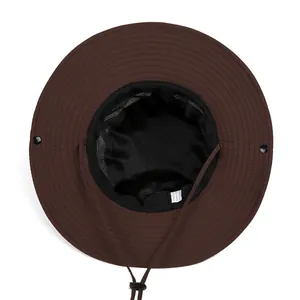 Detail view of breathable mesh lining and adjustable windproof cord on hiking hat