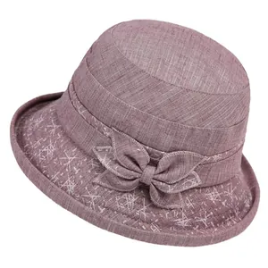 Elderly women's pink sun hat with floral brim and bow detail for spring and autumn
