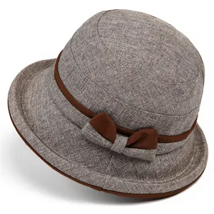 Women's breathable cotton linen sun hat in grey-brown with a dark brown decorative bow