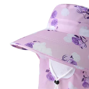 Detail of wide brim sun hat with purple floral pattern and adjustable chin strap
