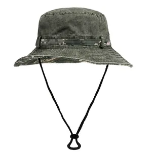 Detailed view of hiking hat with digital camouflage band and adjustable windproof strap