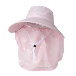 Pink sun hat detail with white rose floral patterns and adjustable windproof rope