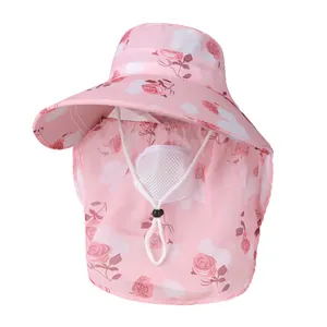 Detail of pink floral sun hat featuring breathable mesh face mask and neck protection