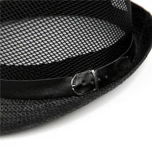 Close-up of black mesh sun hat featuring a leather strap with silver metal buckle detail