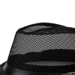 Detail of black summer straw hat with breathable mesh fabric and leather buckle strap