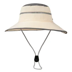 Detail of outdoor sun hat featuring breathable grey mesh band and adjustable wind rope
