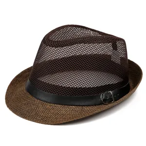 Detail of breathable mesh crown and woven straw brim on dark brown fedora hat