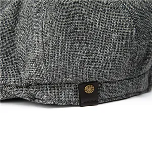 Béret gris en lin pour homme avec boucle métallique vintage et texture respirante