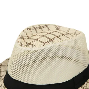 Close-up of breathable mesh texture and plaid weave pattern on men straw sun hat