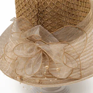 Straw sun hat for women with mesh bow and pearl trim for elegant outdoor beach sun protection