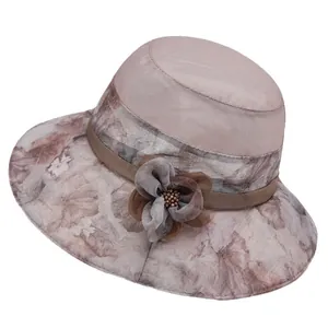 Women's wide brim sun hat with floral pattern and mesh top for summer sun protection