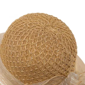 Women's khaki straw sun hat with mesh flower detail and metallic woven texture