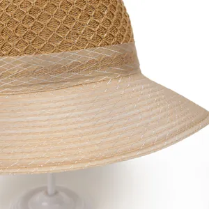 Women's straw sun hat with mesh flower detail and breathable hollow-out weave