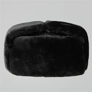 Detail showing thick black faux fur and leather stitching on winter Ushanka hat