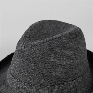 Detailed close-up showing the premium wool felt texture of this dark grey men's fedora hat