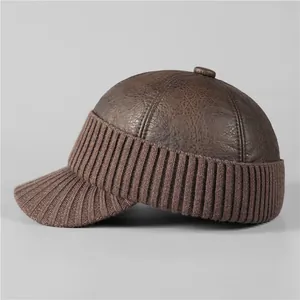 Winter faux leather baseball cap for men featuring warm knitted brim and thermal lining