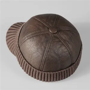 Winter faux leather baseball cap with knit trim and ear protection for men in dark brown