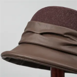 Elegant women's winter bucket hat with brown wool felt and textured leather brim