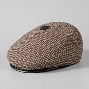 Detail of vintage plaid newsboy hat with fleece lining and leather trim for men