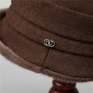 Deep brown warm winter cloche hat for women with faux fur trim and silver buckle