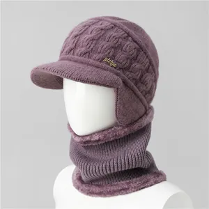 Detailed view of dark purple knit hat and scarf set with thick warm faux fur lining