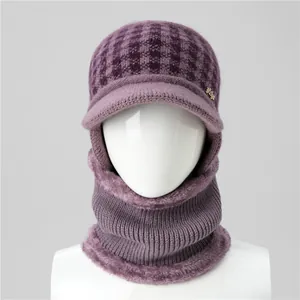 Detailed close-up of purple knit hat with warm plush lining and integrated neck scarf