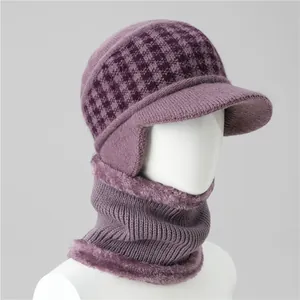 Close-up of purple knit earmuff hat and neck warmer set with fleece lining for elderly women