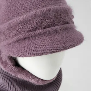 Detail view of purple winter knit hat and neck warmer set with faux rabbit fur trim