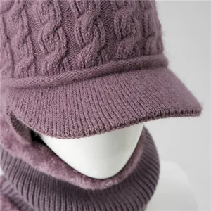 Macro shot of thick purple knit hat with warm plush lining and cable knit texture