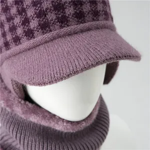 Detail of purple winter knit hat and scarf set with thick fleece lining and ribbed edges