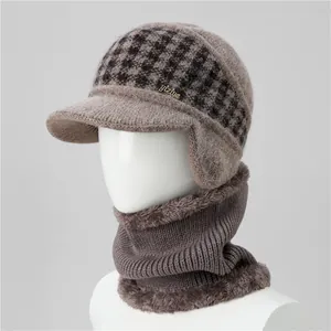 Detailed view of warm coffee winter knit hat with ear flaps and fleece neck warmer set
