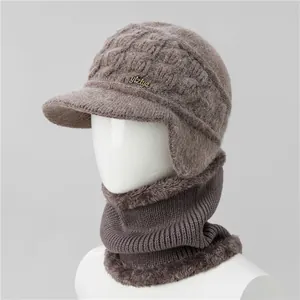 Detailed close-up of thick fleece lining and knit texture on the warm winter beanie hat