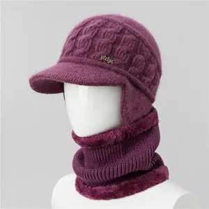 Detailed knit texture and thick plush lining of the purple winter hat and scarf set
