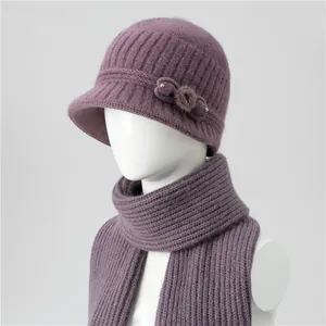 Detailed view of women's knitted hat and scarf set with lavender bow and pearl accents