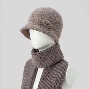 Detail of warm knitted beanie with brim and matching scarf set for elderly women