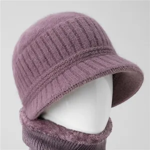 Women's warm winter knit hat and scarf set in elegant dark purple with plush fur lining