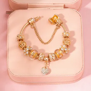 Elegant rose gold plated charm bracelet with sparkling heart pendant and beaded details